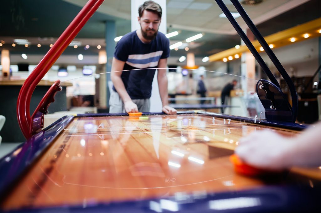 Air hockey is fun even for adults